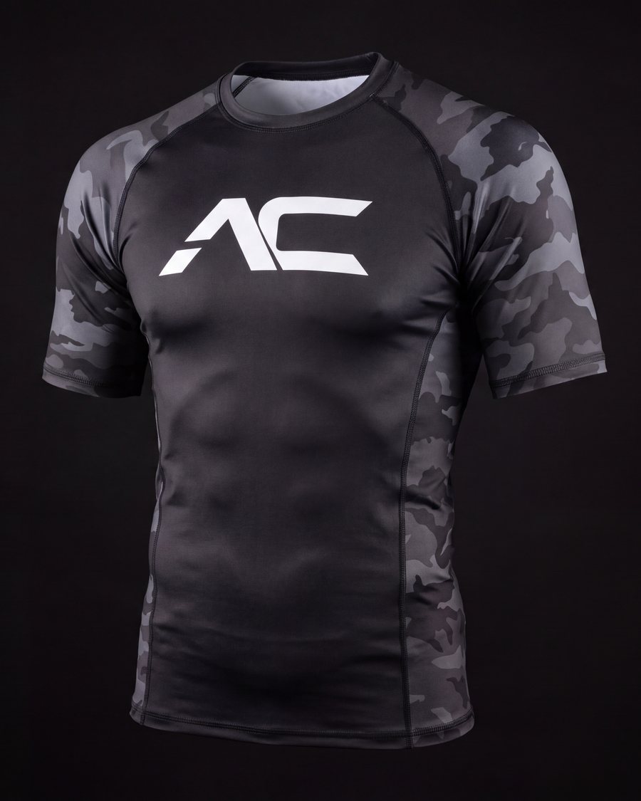 All Corners compression rashguard with grayscale camo sleeves