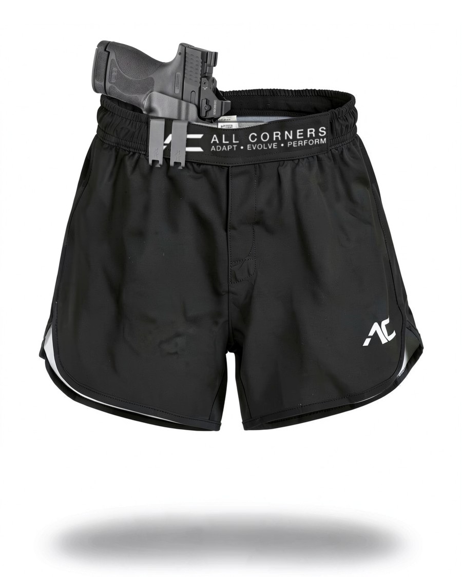 All Corners Women's Shorts in black on an invisible mannequin, with a holstered pistol clipped to the front waistband